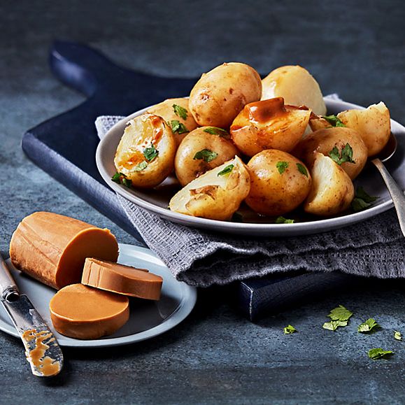 Marmite® butter new potatoes with herbs
