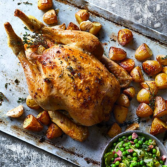 Roast chicken with roast potatoes and greens 