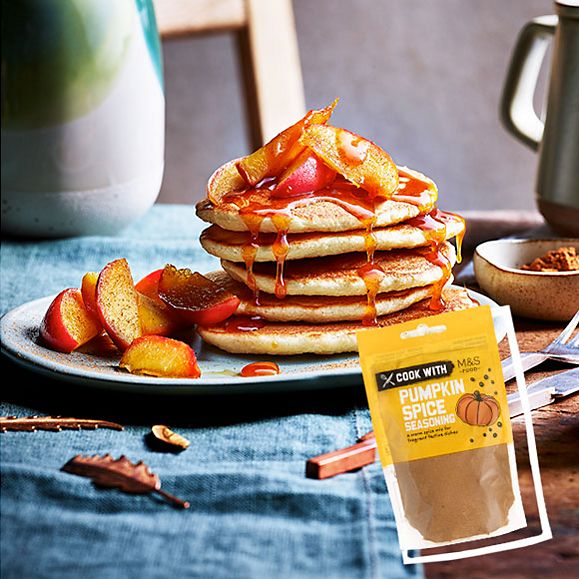 Pumpkin spice pancakes topped with caramelised apples and honey and pumpkin spice glaze