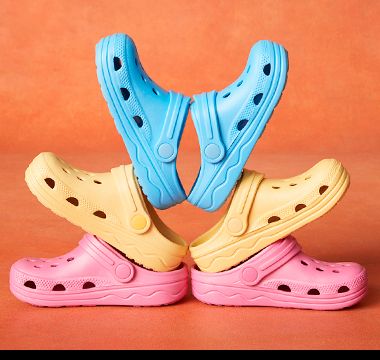 Kids’ blue, yellow and pink clog sandals