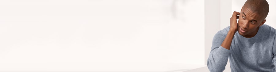 Man wearing grey jumper