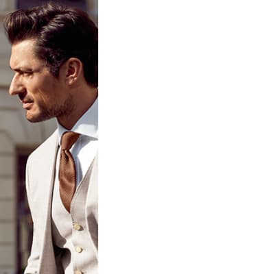 David Gandy wearing three piece linen suit, shirt and tie