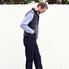 Man wearing jeans and gilet