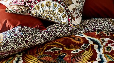 Colourful print bedding and cushions