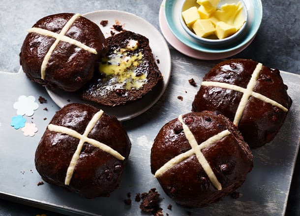 Extremely chocolatey hot cross buns with butter