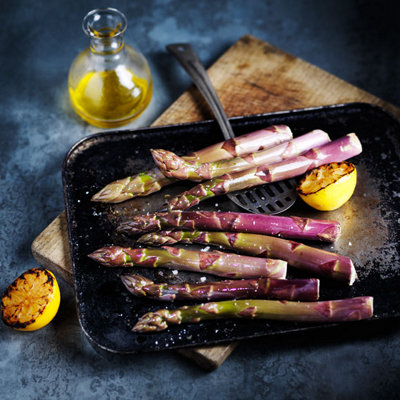 Purple asparagus with salt and roasted lemon 