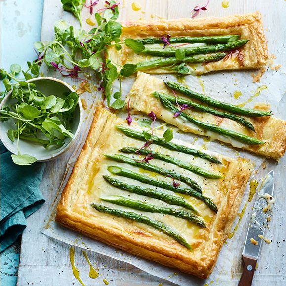Cheat's cheese and asparagus tart served with fresh salad