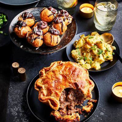 A selection of Gastropub dishes including steak pie and profiteroles