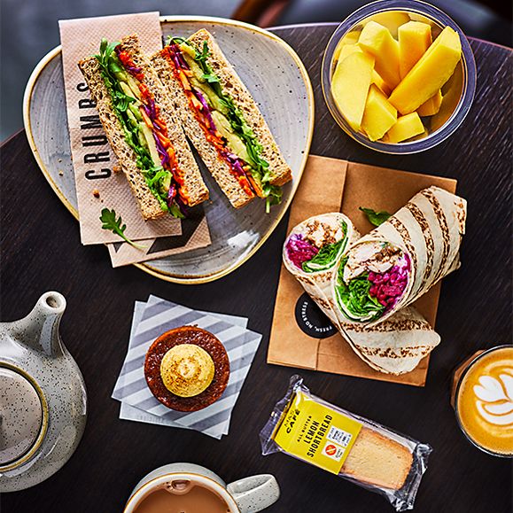 M&S Cafe sandwiches and wraps and mango slices and pots of tea