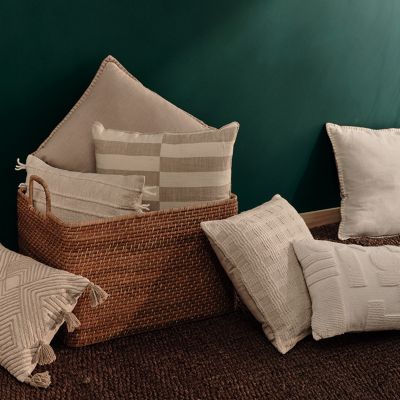 Selection of neutral and beige cushions. Shop cushions