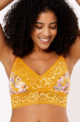 Woman wearing a tropical-print triangle bralet