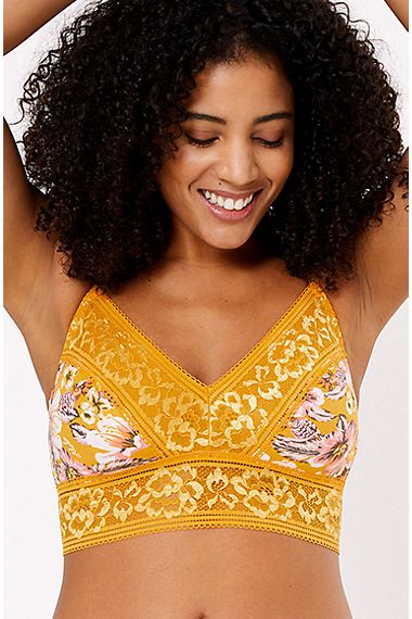 Woman wearing a tropical-print triangle bralet