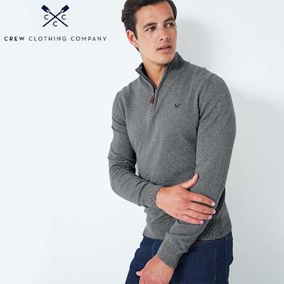 Man wearing grey zip-neck jumper by Crew Clothing. Shop Crew Clothing at M&S. 