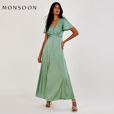 Woman wearing sage-green satin dress by Monsoon. Shop Monsoon at M&S. 