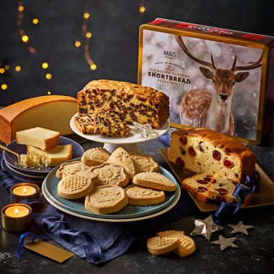 Scottish shortbread, Madeira cake and fruit cake on plates