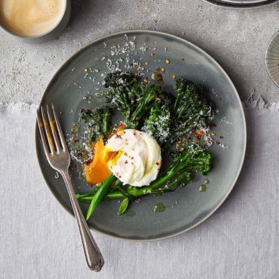 Purple sprouting broccoli with a poached egg