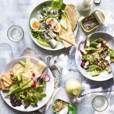 A selection of salads with interesting toppings and dressings