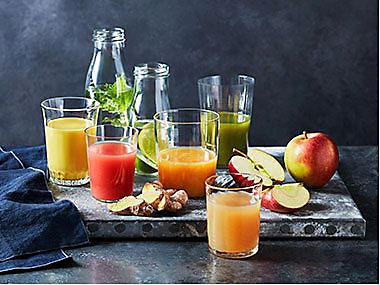 Glasses of fresh fruit juice