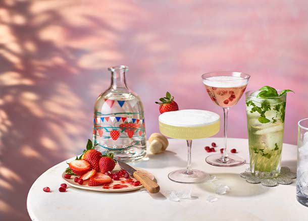 Three strawberry gin liqueur cocktails