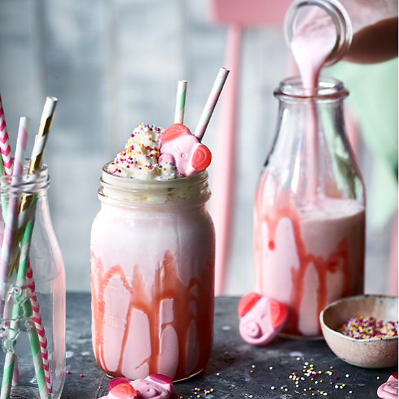 Percy Pig milkshakes containing ice-cream and jazzie sprinkles, topped with Percy Pig sweets
