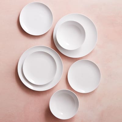 Plain white porcelain dinner plates, side plates and bowls
