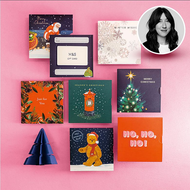 Selection of Christmas cards and gift cards on a pink background. Shop gift cards