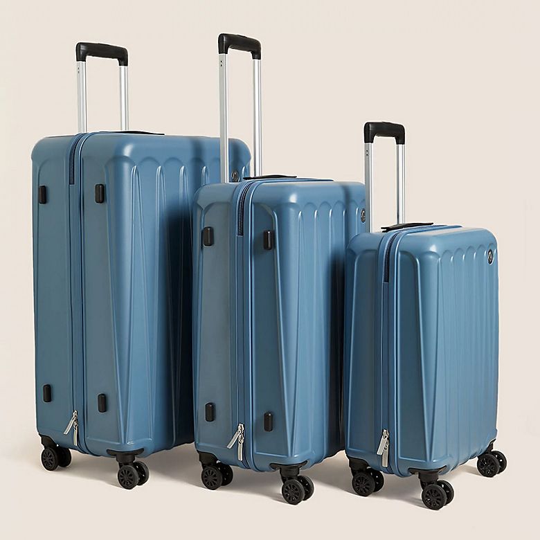 Selection of different sized suitcases. Shop suitcases and luggage 
