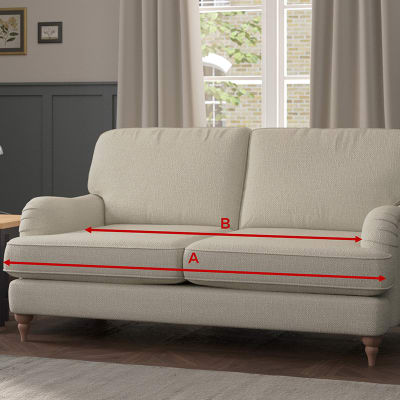 Cream sofa in a living room. Shop sofas