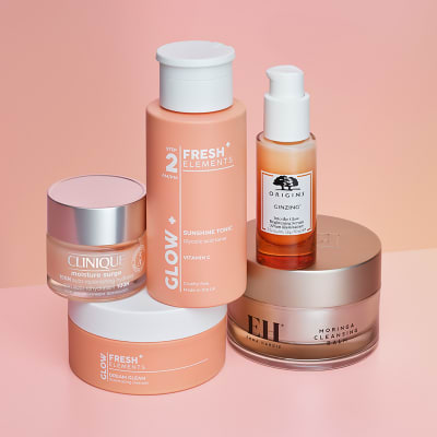 A selection of brightening skincare products. Shop skincare