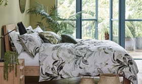 Patterned duvet cover on double bed