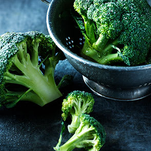 A colander full of broccoli