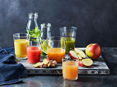 A selection of fruit, juices and smoothies