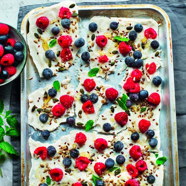 Frozen yogurt berry bark on tray