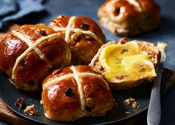 Luxury hot cross buns with butter