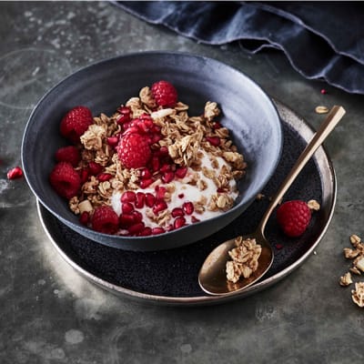 Trifle granola with rasberries and pomegranate