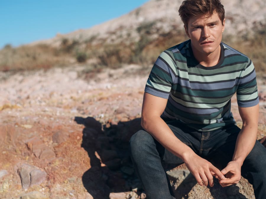 Man wearing striped T-shirt