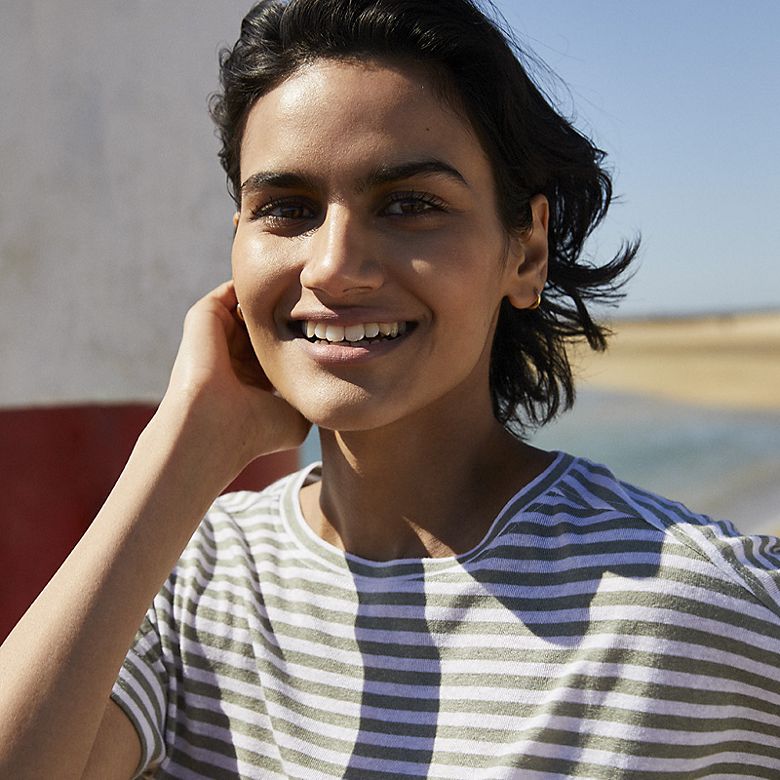Woman wearing striped T-shirt