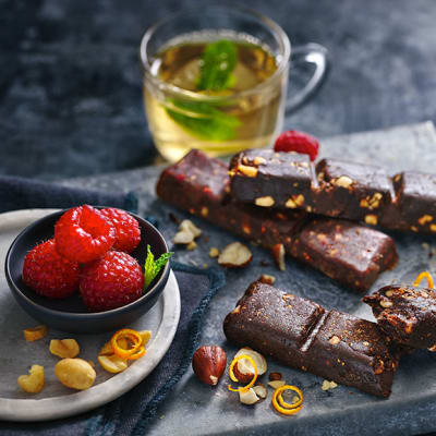 Fruit, herbal tea and almond butter pressed fruit and nut bar