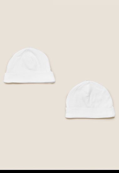 Set of two white cotton baby hats. Shop now