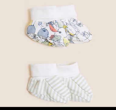 Two pairs of Peter Rabbit blue and white cotton-rich baby booties. Shop now