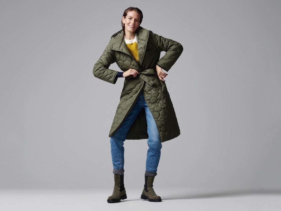 Woman wearing M&S quilted coat and jeans