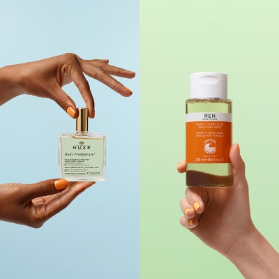 Hand holding Nuxe multipurpose dry oil; hand holding REN Clean Skincare AHA toner