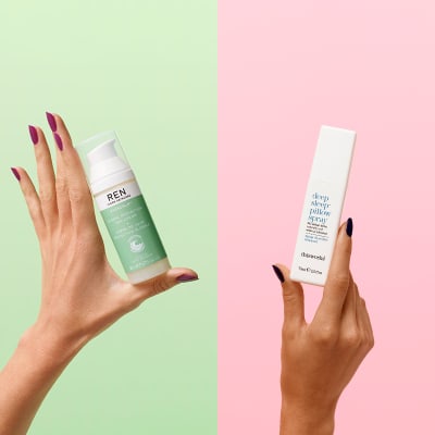 Hand holding REN Clean Skincare Evercalm day cream; hand holding This Works pillow spray