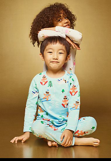 Children wearing Christmas pyjamas