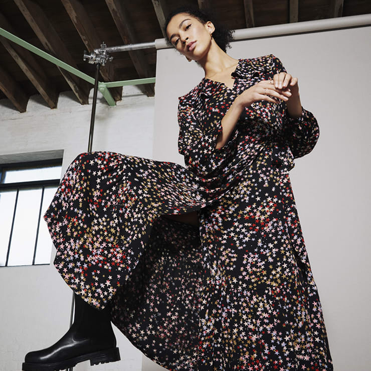 Women wearing floral-print dress from M&S X GHOST collection