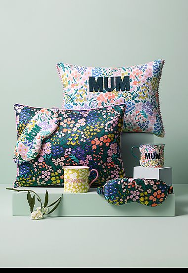 Selection of floral-print cushions, sleep accessories and mugs
