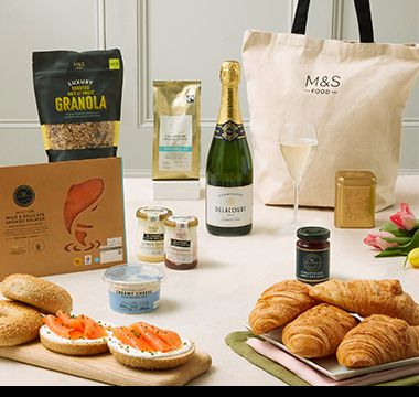 Mother’s Day “breakfast in bed” gift bag, including croissants, smoked salmon and cream cheese bagels and champagne