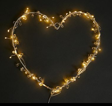 Heart-shaped room decoration with lights. Shop now
