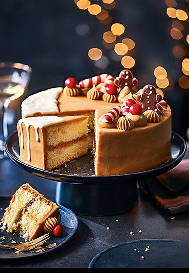 Christmas caramel cake topped with festive decorations. Order now 