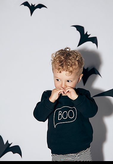 Boy wearing Halloween T-shirt and leggings set. Shop Halloween gifts 